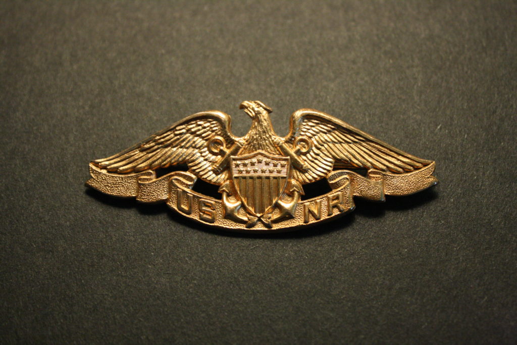 U.S. Naval Reserve Insignia - a collection of writing