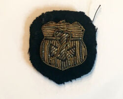 Corps of Cadets cuff device.