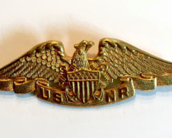 U.S.N.R badge.