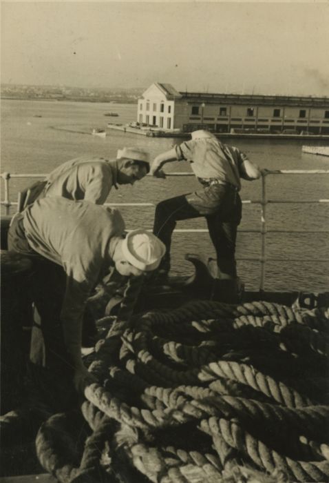 Sailors securing mooring lines, 1930s